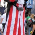 Uncle Sam with sign at the DNC in Denver