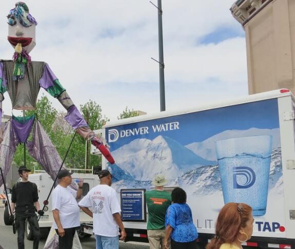 Thirsty the Giant Parade Puppet visits Denver Water for a glass of cool deliciousness!