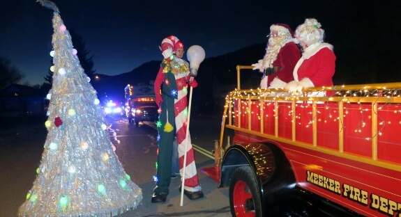 Santa and Mrs Claus on Parade with Stretch the Giant Candy Cane and Dancing Christmas Tree.