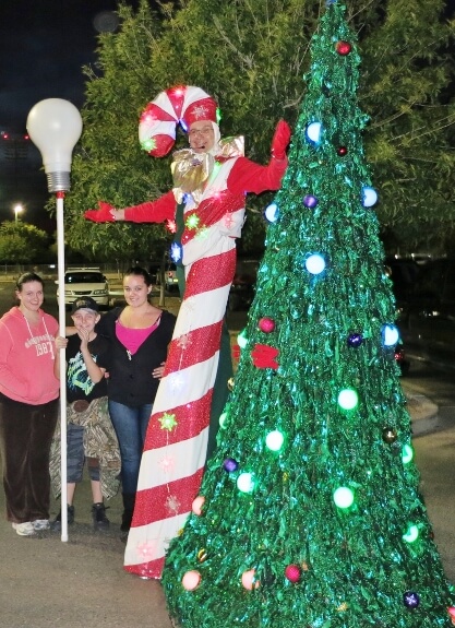 Stretch the Giant Candy Cane and Dancing Christmas Tree at the Surprise Party