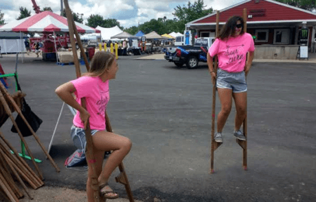 Girls learning to Stilt Walk